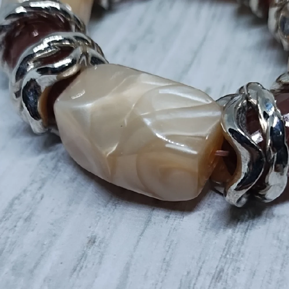 Elegant Brown and Cream Swirl Beaded Stretch Bracelet W Silver Tone Accents